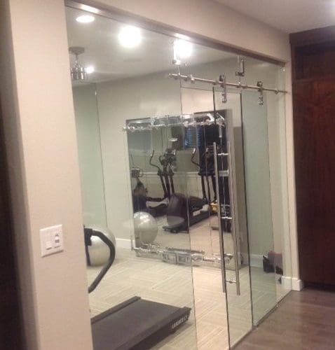 Dorma Manet Sliding Doors and Wall at Gym Room | Glass Wall Systems Gallery | Interior Glass Products | Anchor-Ventana Glass