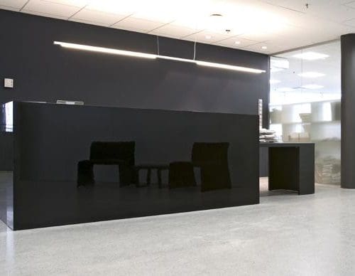 Black Glass in Modern Office Reception Area | Glass Wall Systems Gallery | Interior Glass Products | Anchor-Ventana Glass